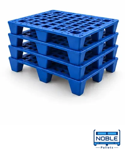 Stacked blue plastic pallets illustrating a nestable design. Noble Pallets & Packaging, Pakistan.